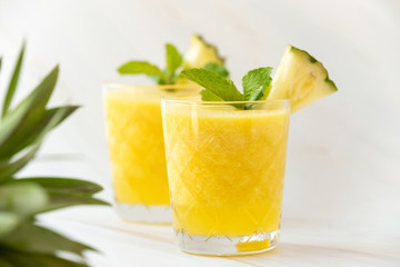 Refreshing healthy pineapple fruit smoothie drinks