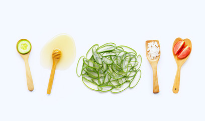 Natural ingredients for homemade skin care on white.