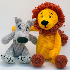 The lion and the wolf are good friends.Dolls, amigurumi toys handmade crocheted.