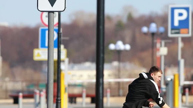 Two young men doing acrobatic parkour tricks