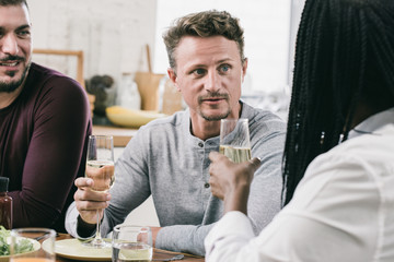 Group of diverse neighbors celebrating in social gathering party