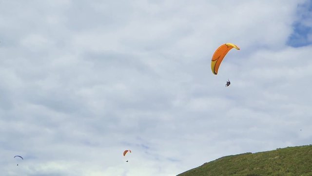 Paragliders flying at Rhossili, Wales