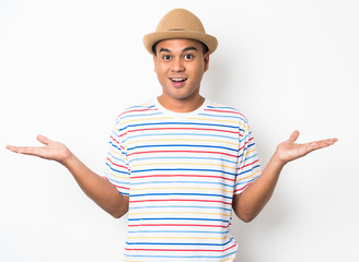 Happy young asian man celebrates with two hand in the air on isolate white background.