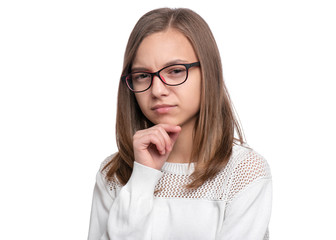 Portrait of beautiful Thoughtful Teen Girl in eyeglasses. Young Student - ponder and dreaming, isolated on white background. Back to School and childhood concept.