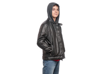 Portrait of a Handsome brutal Teen Boy in a black Leather Jacket with Hood. Smiling fashion Child...