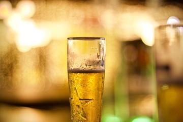 glass of beer on a background