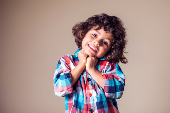 Portrait of a cute little smiling boy. Children, emotions concept