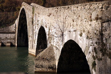 Devil's Bridge or Ponte della Maddalena. Lucca, Borgo a Mozzano. The bridge joins the two banks of the Serchio river and was built in medieval times.