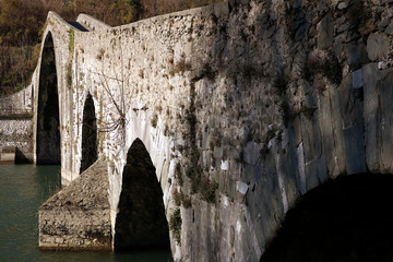 Devil's Bridge or Ponte della Maddalena. Lucca, Borgo a Mozzano. The bridge joins the two banks of the Serchio river and was built in medieval times.