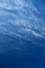 Blue sky. Sky background. White clouds.