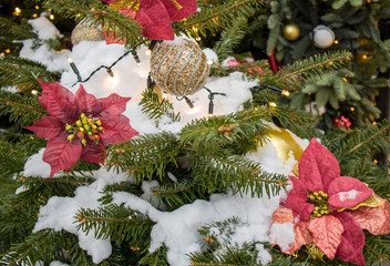 Festive Gifts Decorated with Linen Cord, Cinnamon, Pine cones, Walnuts. Toned image. Snow Drawn