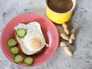 egg sandwich for Breakfast and coffee on concrete background