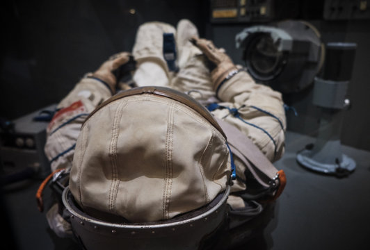 cosmonaut or astronaut or spaceman suit and helmet on board the spaceship reasy for landing or space operations.