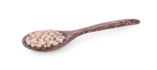 white Pepper seeds in wooden spoon on white background.