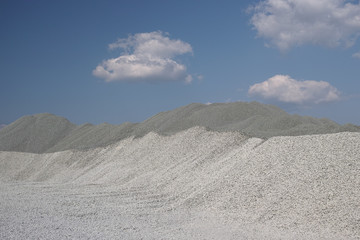 A huge hill of gravel in the place of its storage in the open air. High resolution and detail.