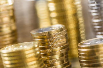 Towers of the euro coins stacked in different positions