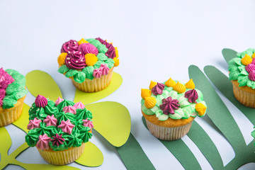 Multicolored cupcakes with decoration like indoor plants succulents