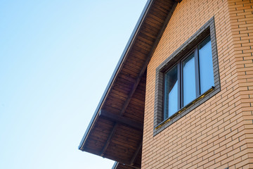 Fototapeta na wymiar New house eaves on blue sky.