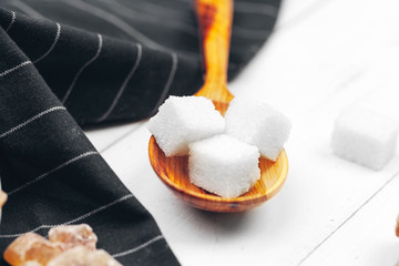 Decorative spoons with white sugar