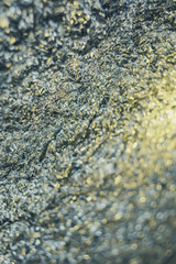 Abstract blur and defocused crumpled gray foil texture for background. Artistic colorful bokeh. Toned image does not focus. Pattern for poster, print.