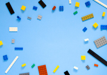 Background for children's site, for the menu. Children's constructors on blue. Multi-colored cubes. Games for motor developing memory and mind. 
