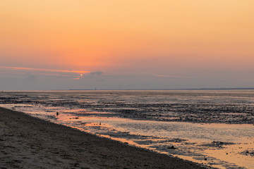 north sea sunset with beach