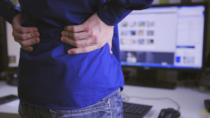 Back pain behind the computer in the office