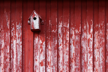 Nesting box on old wooden walls on Frøya in Norway
