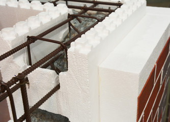 Insulating concrete forms ICF  with metal reinforced concrete house walls.