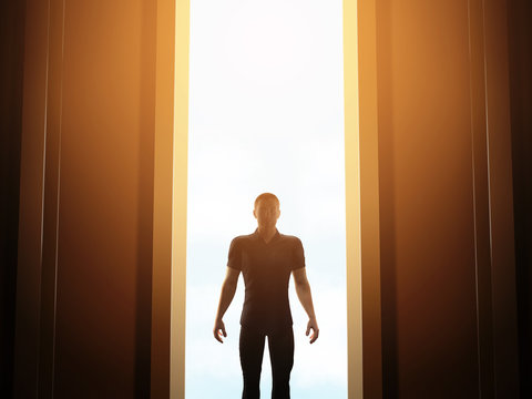 Man standing in front of mysterious open door