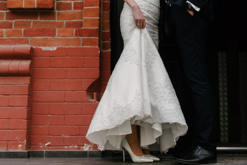 Feet of the bride and groom at a wedding