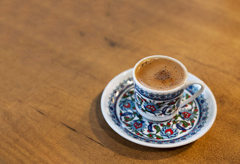 traditional oriental nougat with turkish coffee on a wicker tray