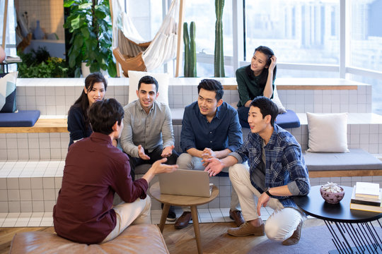 Young abroad students talking in seminar