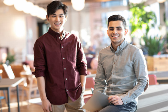 Portrait of confident young abroad students
