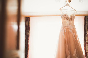 The perfect wedding dress in the room of the bride