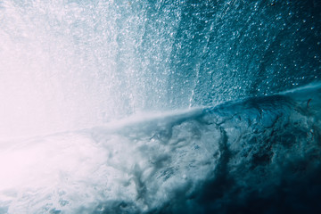 Wave underwater. Blue ocean in underwater