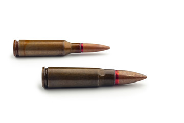 Two old bullets for automatic rifles of 5.45 and 7.62 caliber. Selective focus.