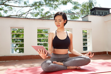 Woman meditating at home