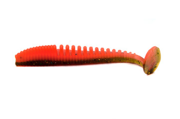 Fishing lure silicone twister isolated on white background.