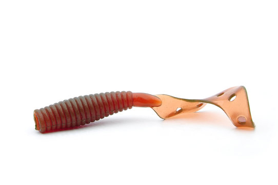 Fishing lure silicone twister isolated on white background.