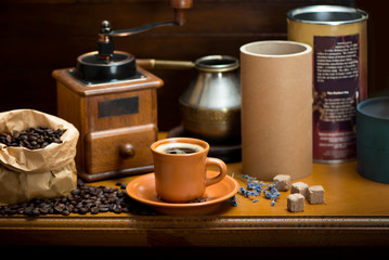cup of coffee, turka, coffee beans and a coffee grinder, croissants