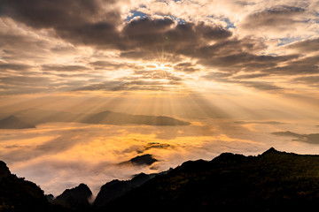 Sunrise with mist on hills 