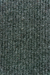 Synthetic fiber carpet