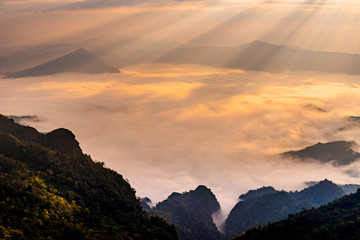 Sunrise with mist on hills 