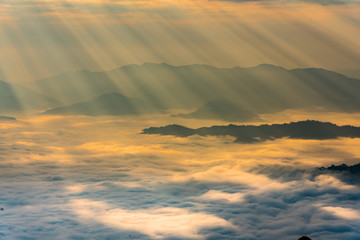 Sunrise with mist on hills 