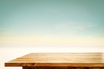 desk of free space and blurred beach background. 