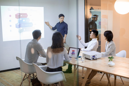Business people having meeting in board room 