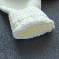 children's woolen clothes. sleeve close up