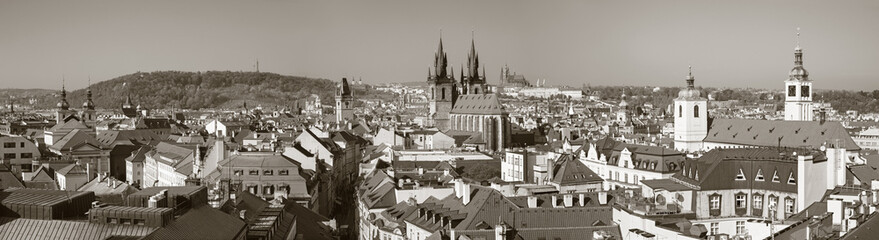 Prague - The panorama of the city with the Charles bridge and the Old Town  in evening light.