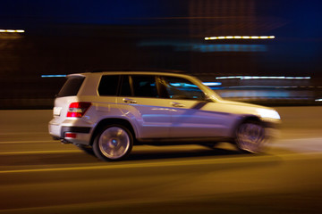 The car rushes on the highway at high speed    Photo taken from the roadside ,Moscow, spring 2019, sky, car, road 